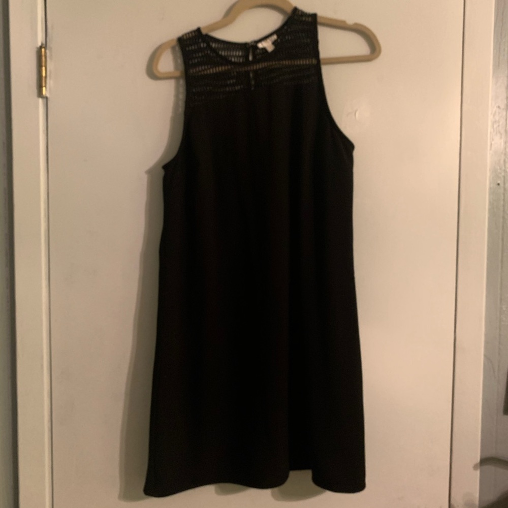 Black dress with beautiful shoulder details.